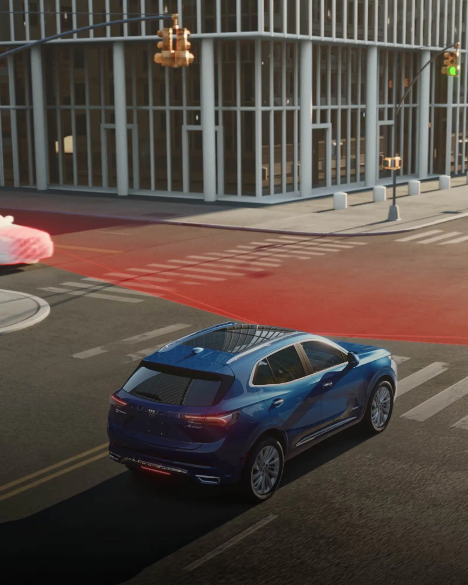 Buick Envision 2026 bleu avec visualisation d’aide à la conduite en ville.