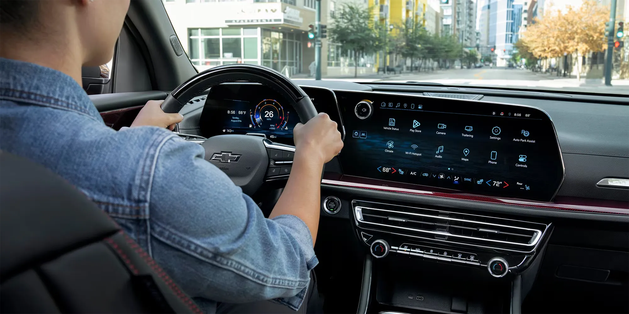 Tableau de bord du Chevrolet Traverse 2026 avec grand écran central tactile.