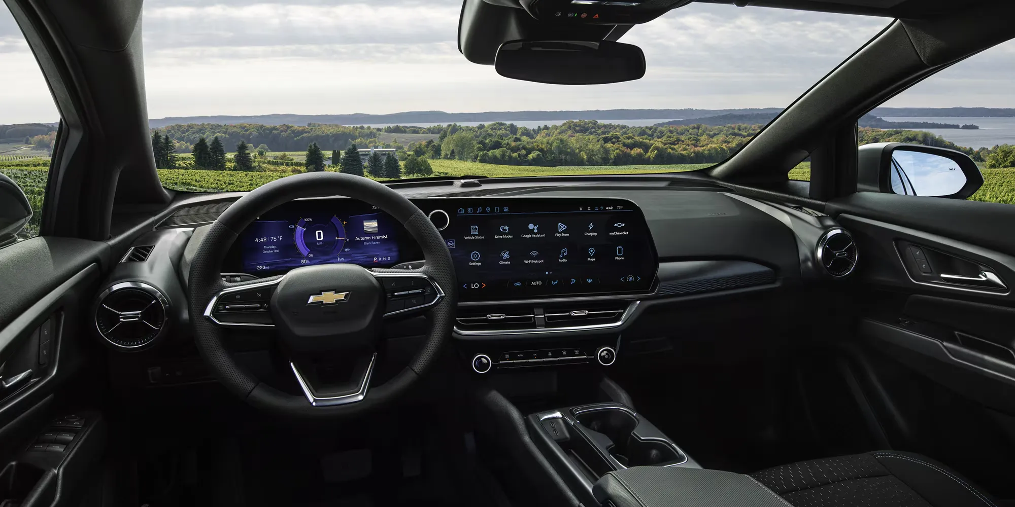 Habitacle du Chevrolet Equinox EV 2026 avec écran central et tableau de bord numérique.
